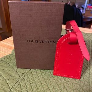Louis Vuitton red luggage tag